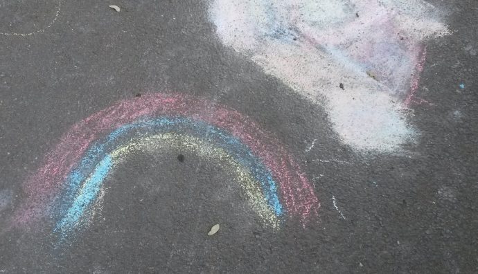 rainbow in chalk on footpath