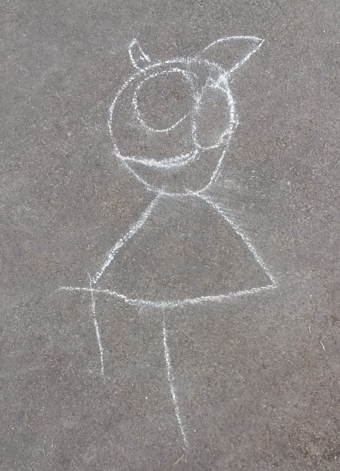 Child's chalk drawing of a person