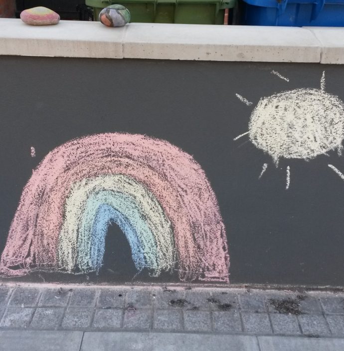 rainbow in chalk on a wall