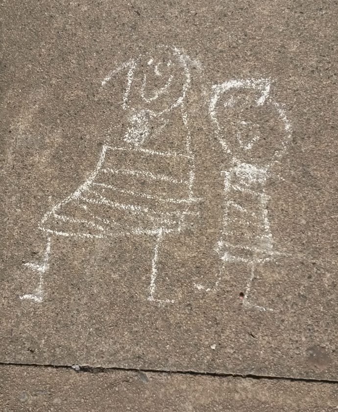 Day 57 of lockdown - chalk drawing of a boy and a girl on footpath